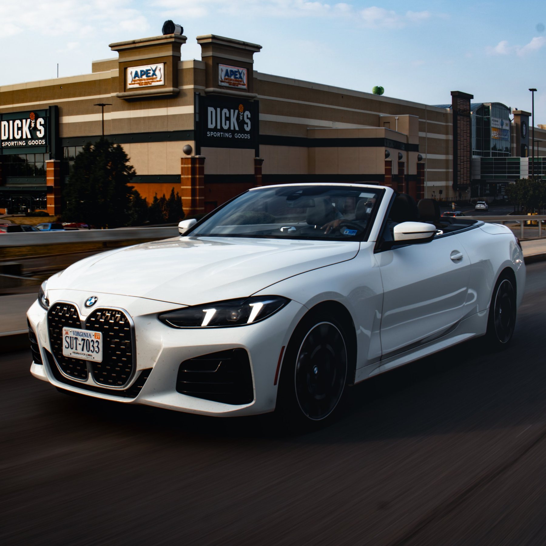 White BMW 4 Series convertible, rolling