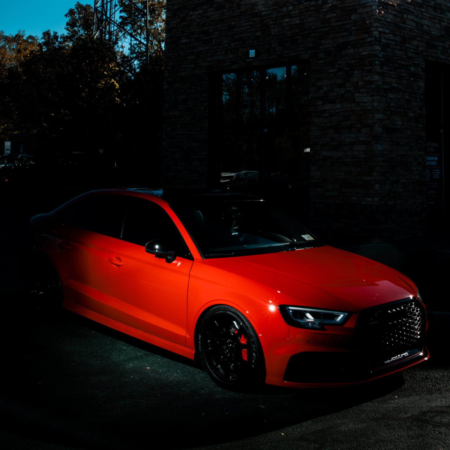 Red Audi RS3 in hard light