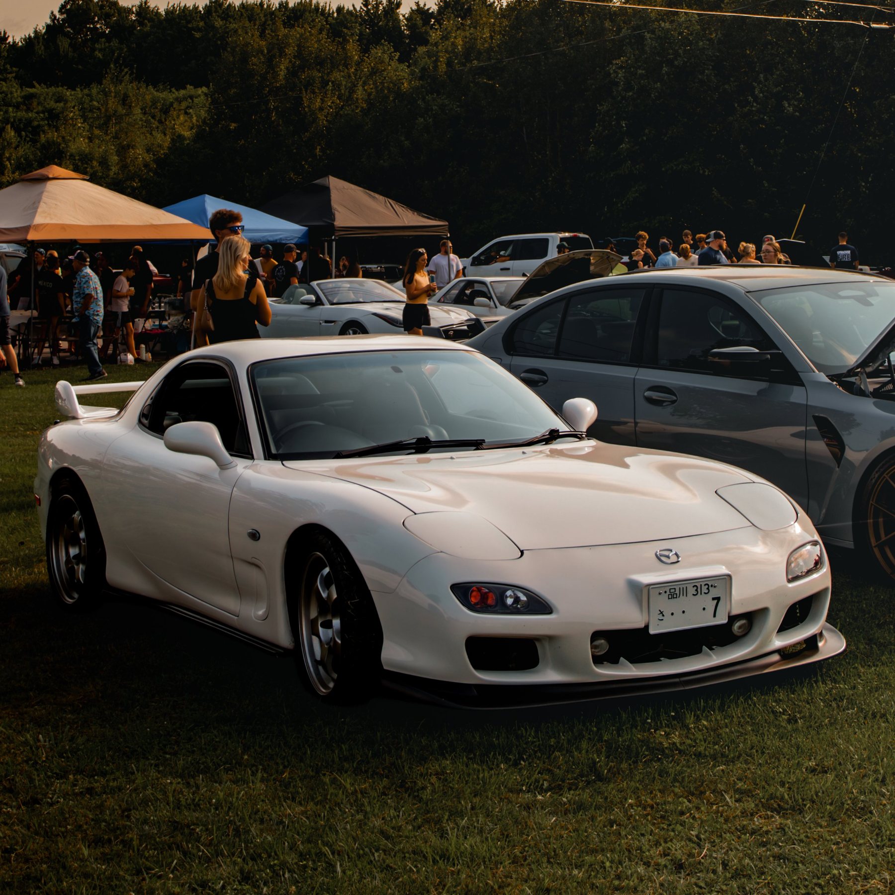 White Mazda RX-7 at a car meet